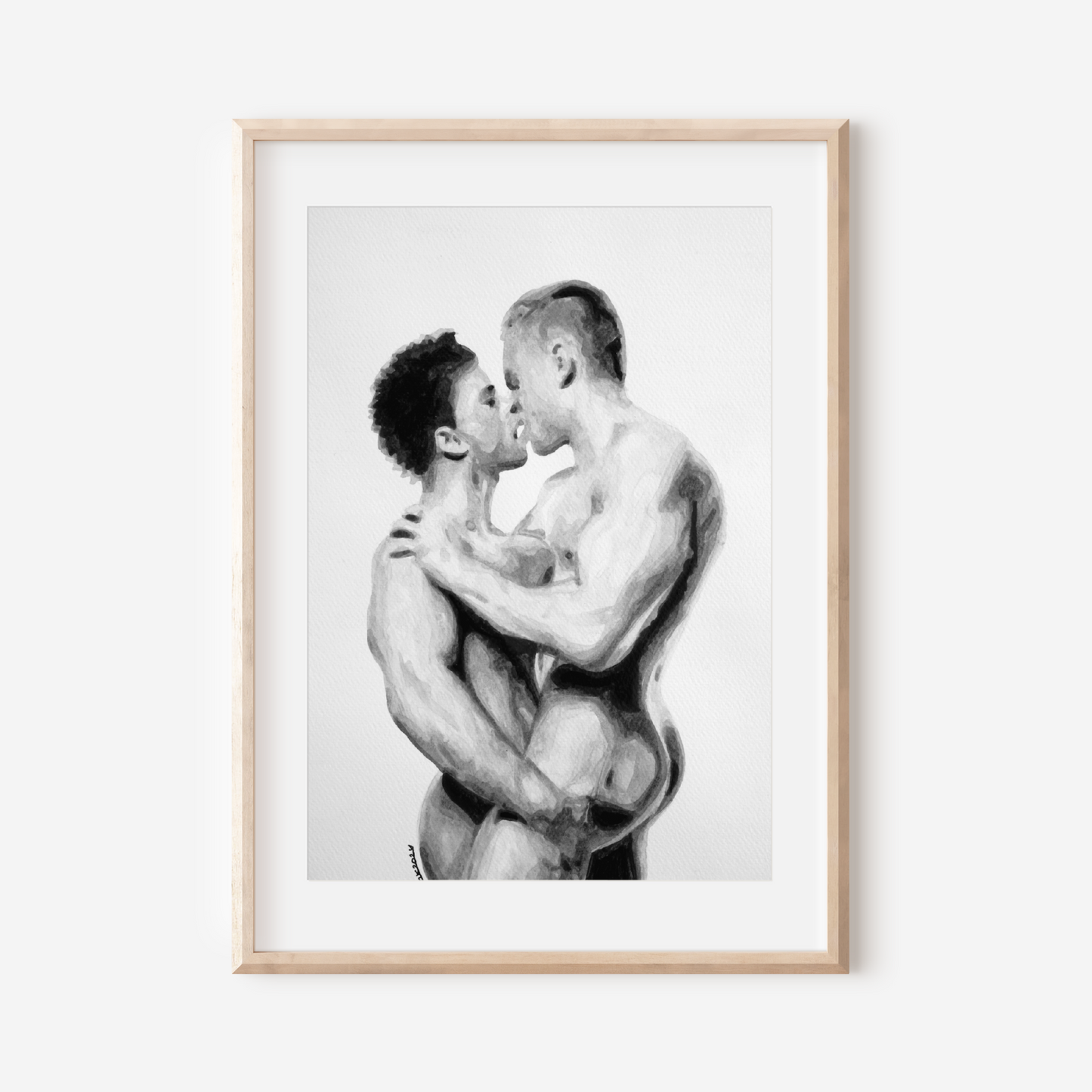 Framed black and white artwork of two men embracing on a white background