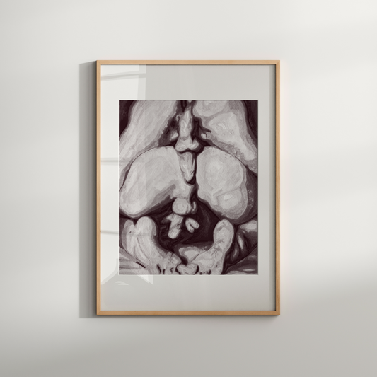 Framed black and white artwork on a light gray wall