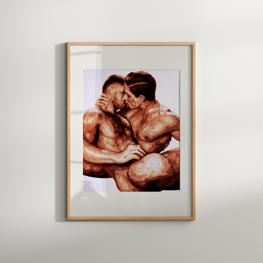 Framed artwork of two people embracing on a light gray background