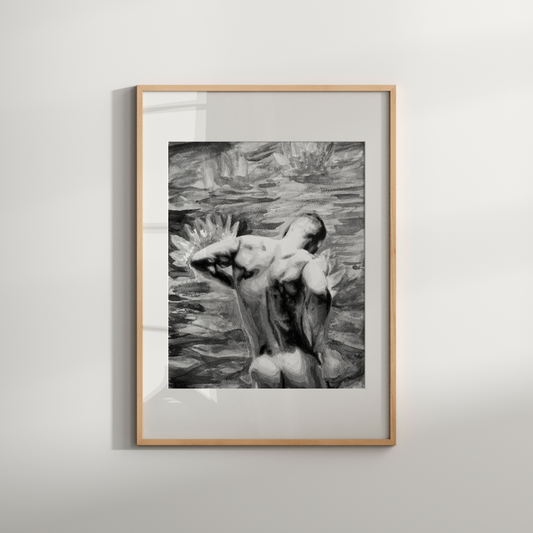 Framed black and white artwork of a nude figure in water on a light gray wall.