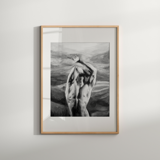 Framed black and white artwork of a nude figure on a plain wall