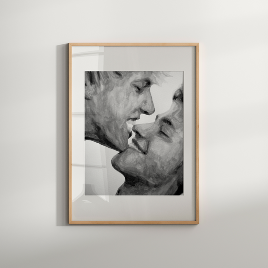 Framed black and white portrait of two people on a light gray background