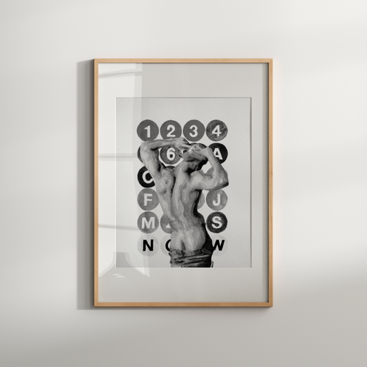 Framed artwork with a hand holding keys and alphabet letters on a light gray background