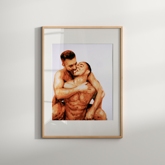 Framed artwork of two people embracing on a light gray background