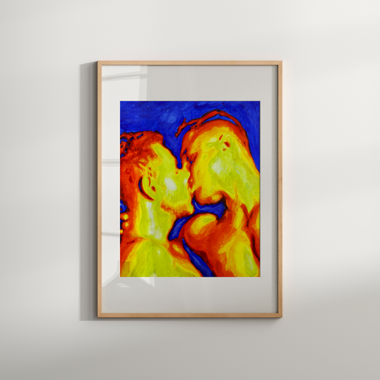 Framed abstract artwork with warm colors on a plain wall