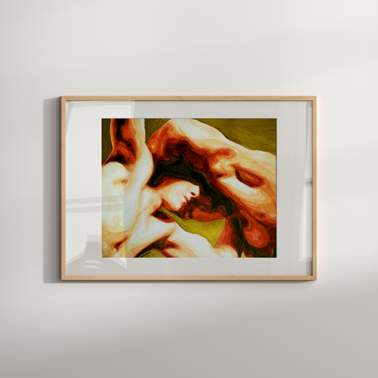 Framed artwork of a woman's face on a white wall