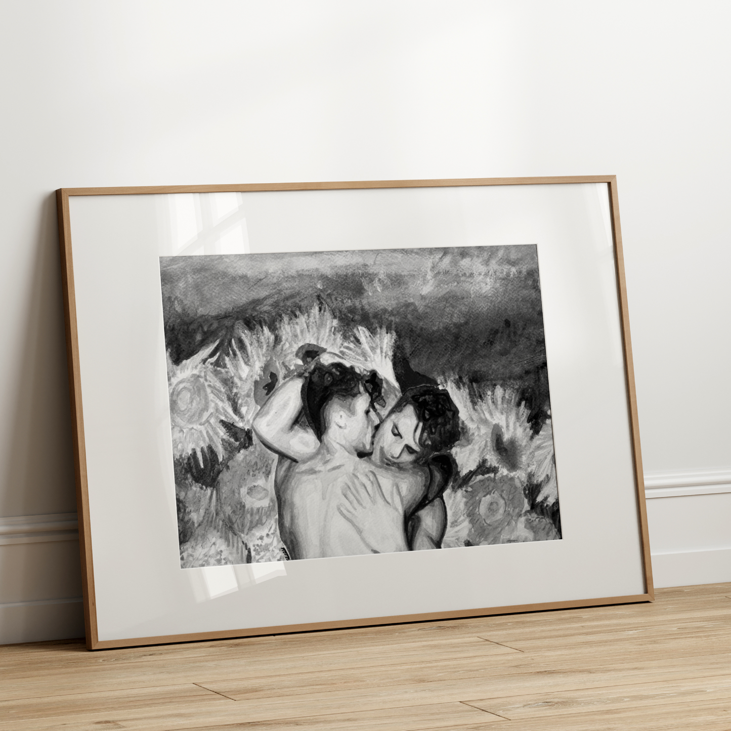 Framed black and white artwork on a wall