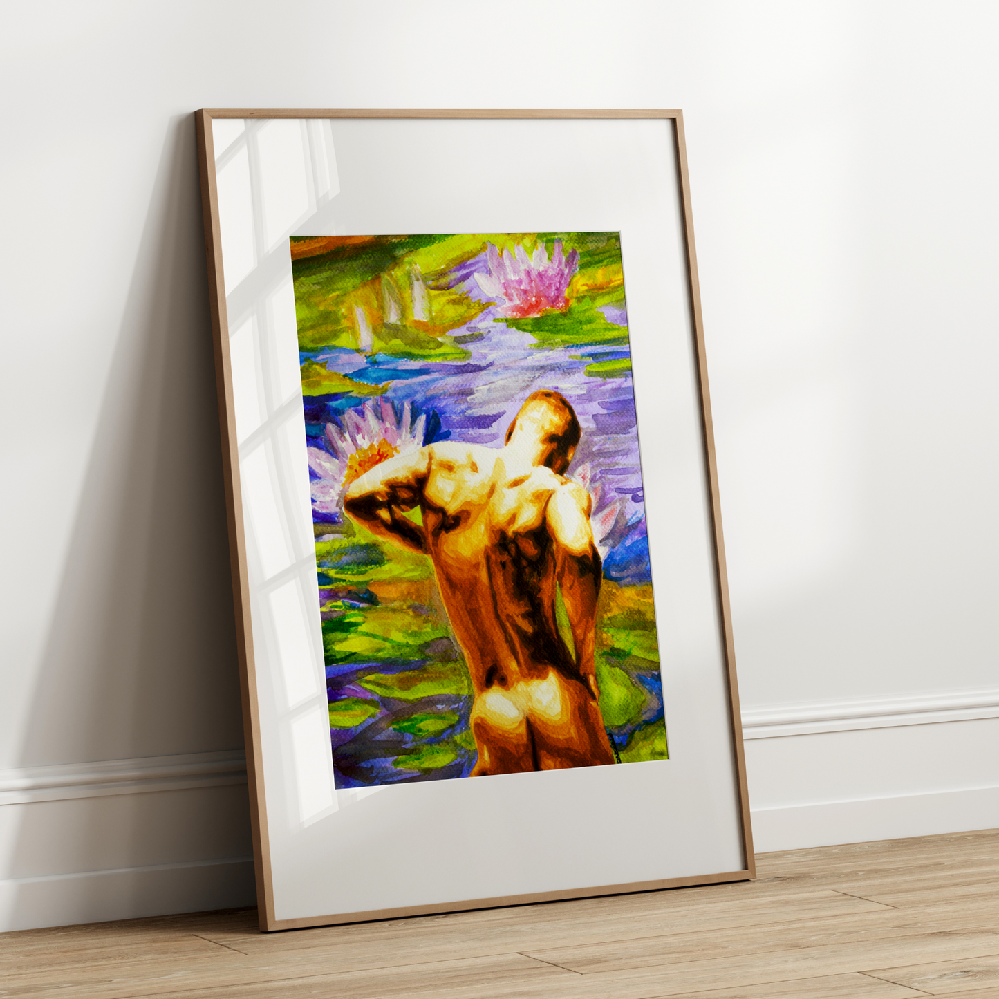 Framed artwork of a nude figure among water lilies on a white wall.