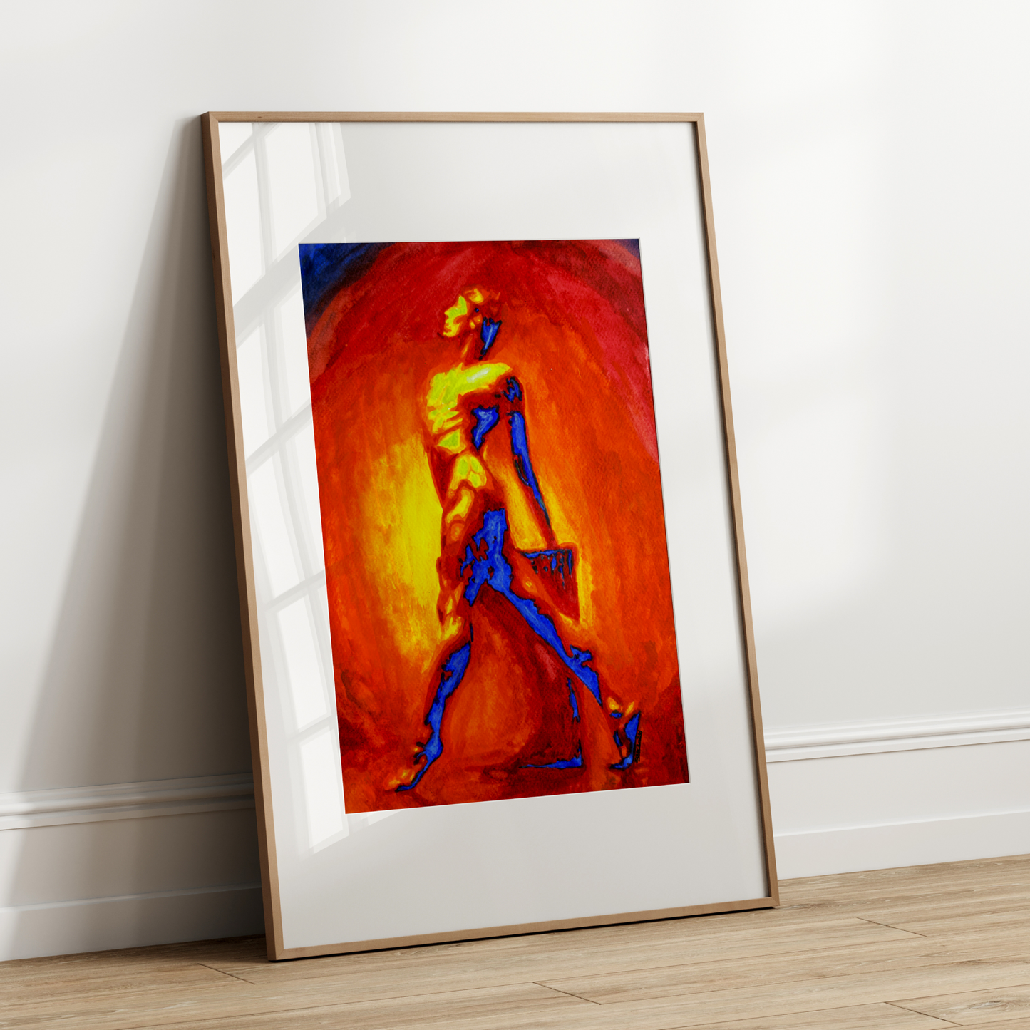 Framed abstract painting on a white wall