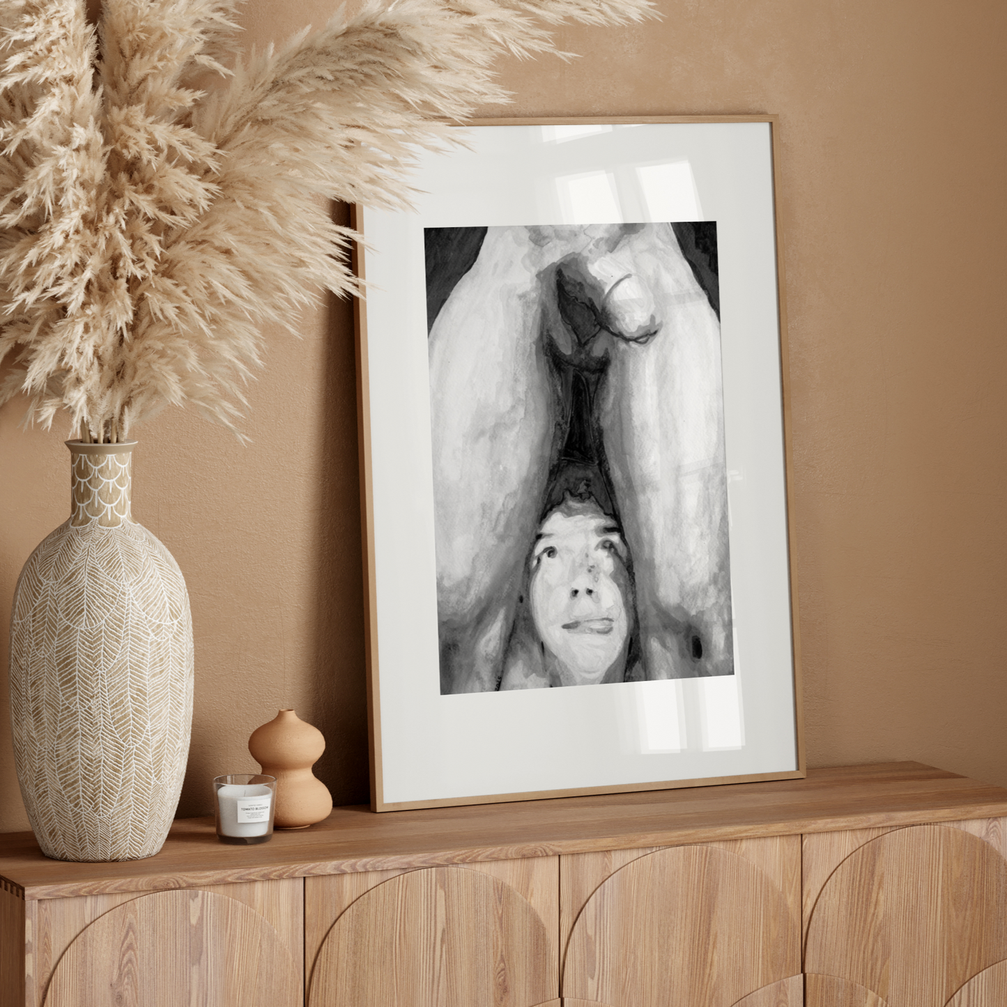 Black and white gay erotic illustration of a playful man licking his lips while looking up at a male figure, with suggestive body language.