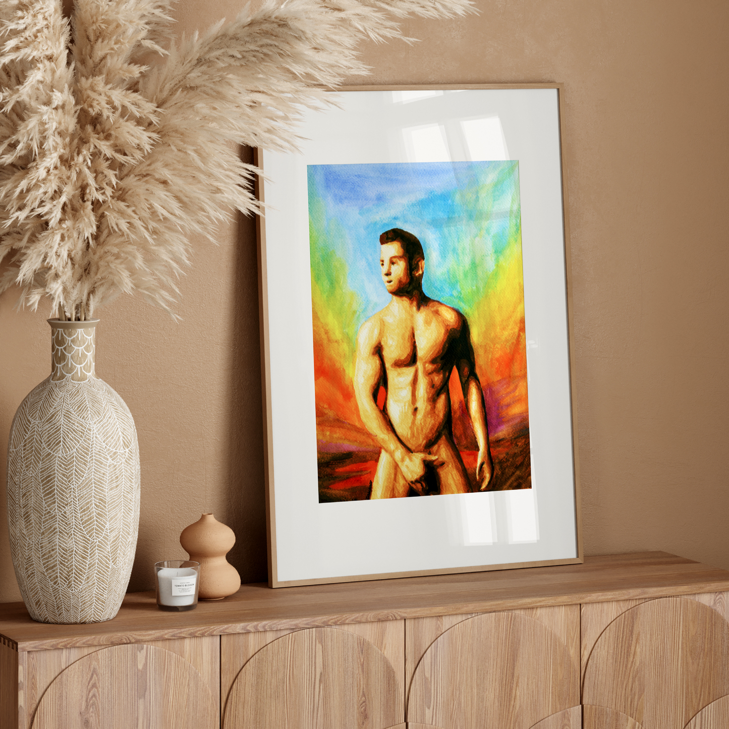 Watercolor painting of a muscular nude man with hands modestly covering himself, standing under a rainbow sky, symbolizing pride, strength, and vulnerability. Original Zak Pop Art.