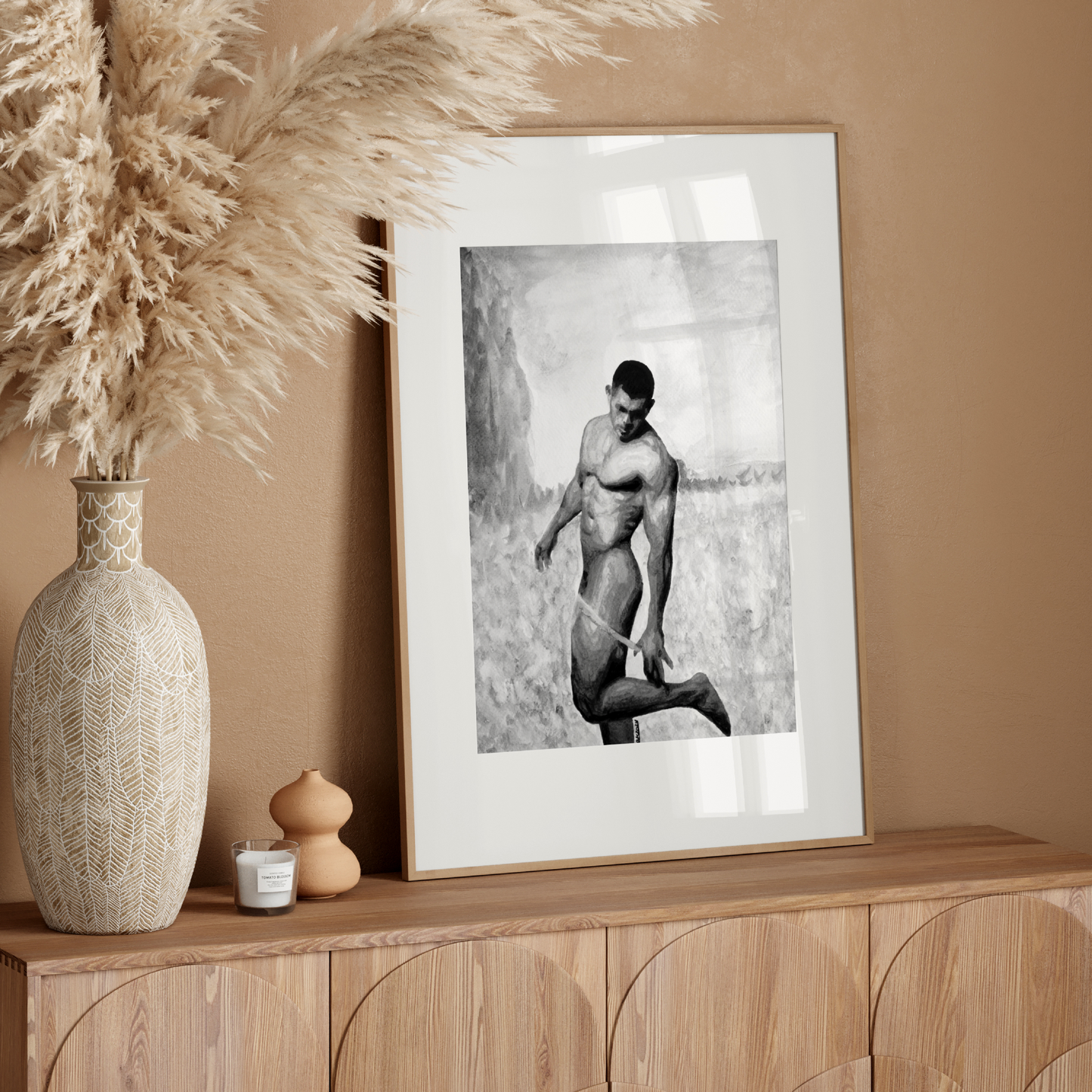 Black and white watercolor of a nude man lifting one leg to undress in a calm field, expressing movement, grace, and queer presence.