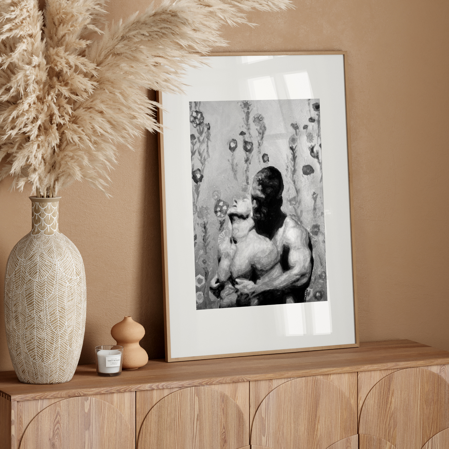 Black and white watercolor of a gay man hugging and kissing his partner's neck from behind. The background shows a grayscale floral pattern inspired by classic shower curtains, creating a sense of quiet domestic queer intimacy.