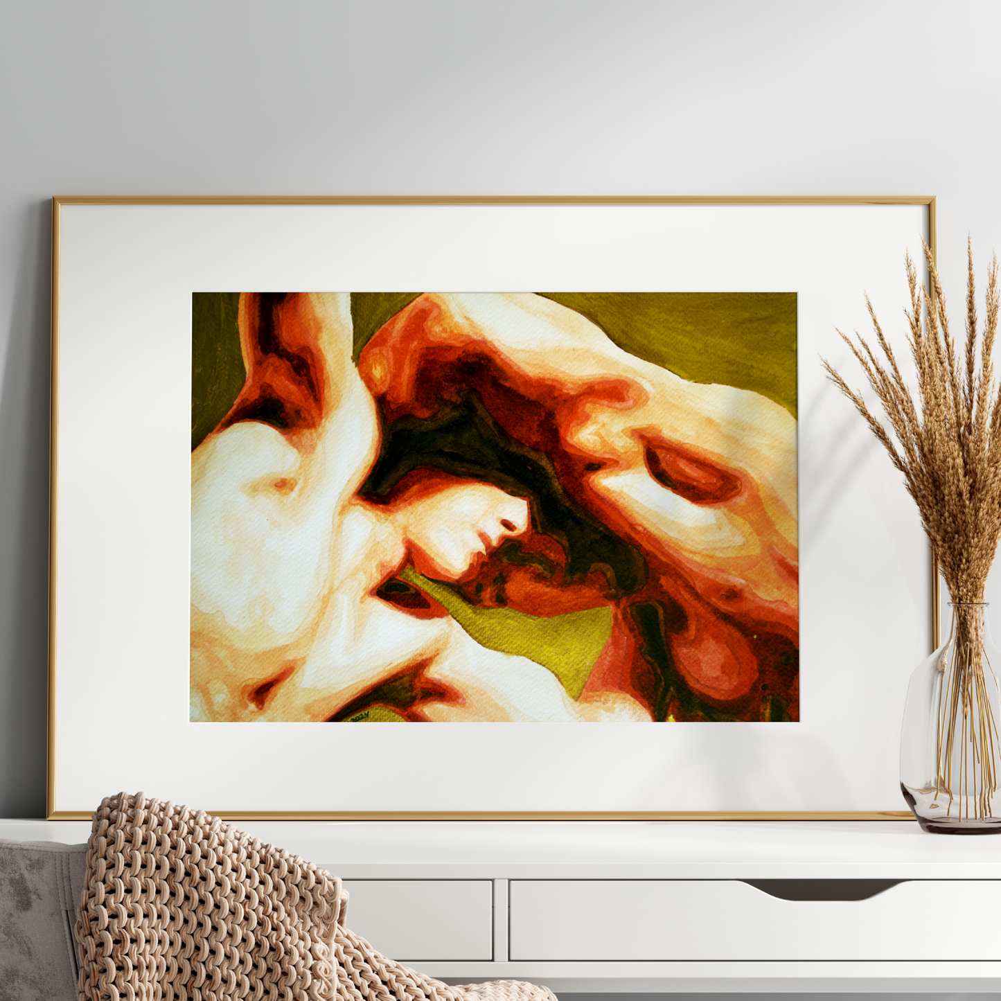 Framed artwork of a classical sculpture on a wall above a white console table.
