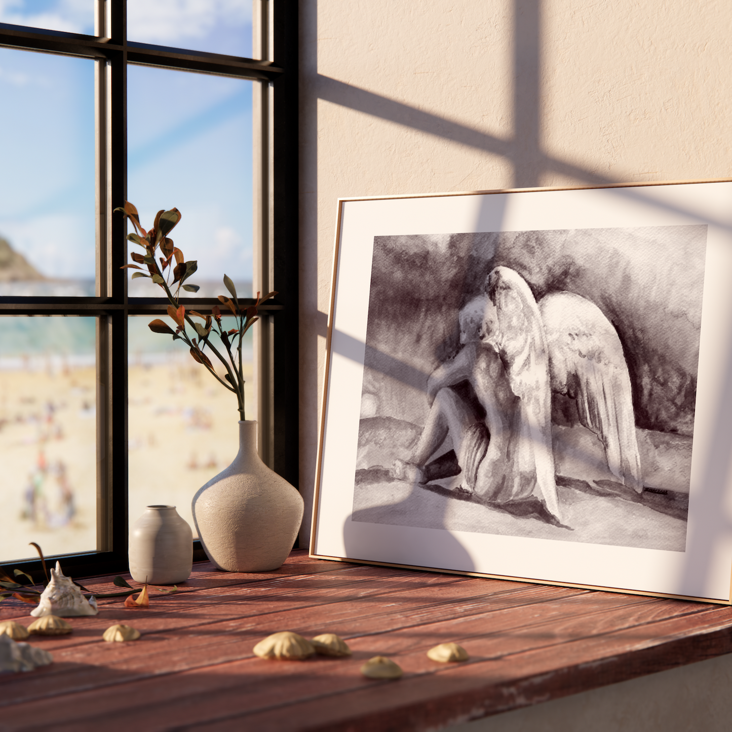 Framed black and white artwork on a wooden shelf with a window view