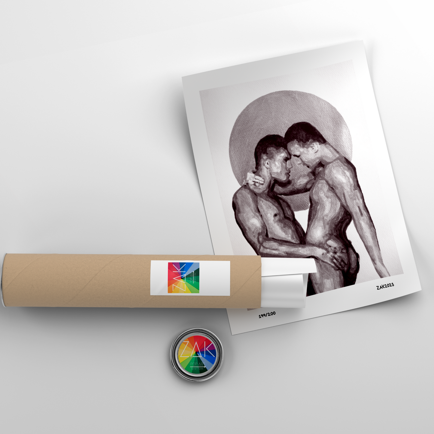 A black and white print of an erotic gay couple, displayed in a frame.
