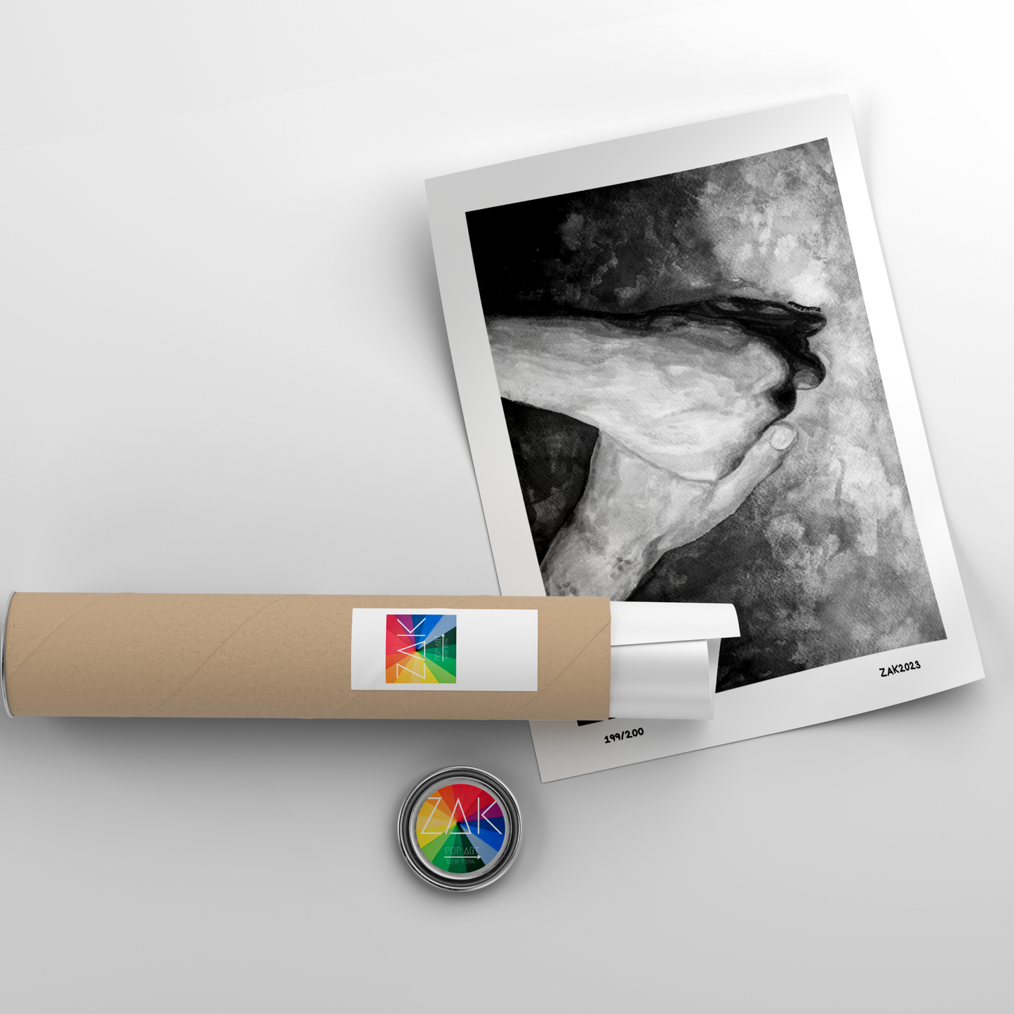Polaroid-style photo with a roll of film and a button on a light gray background