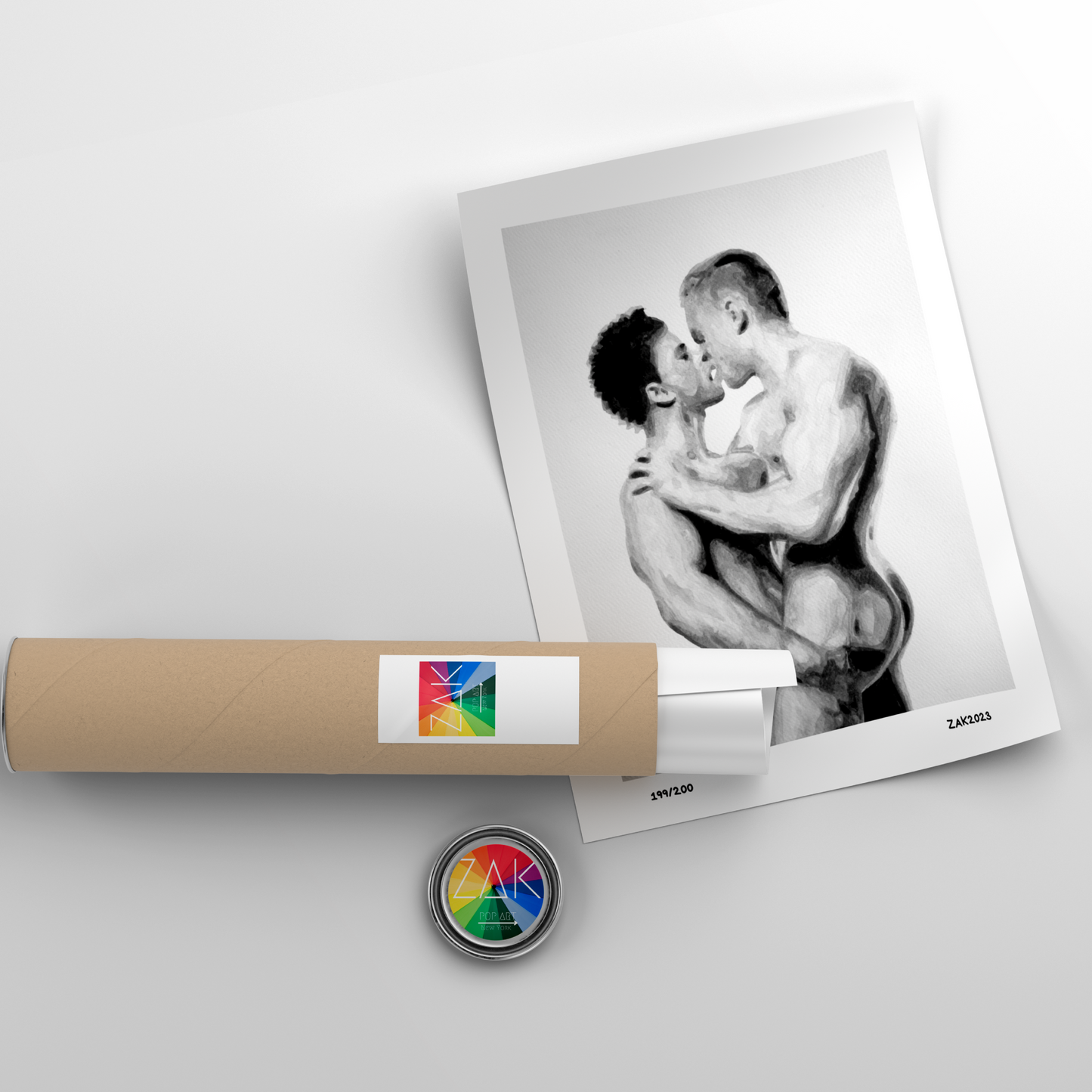 Roll of paper with a photo of two people embracing and a small round object on a light gray background