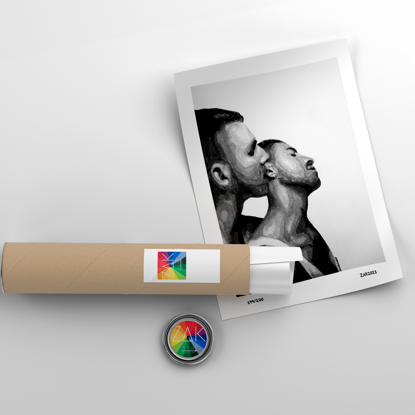 Rolled-up poster with a printed image of two people, a cylindrical product with a colorful label, and a round badge on a light gray background.