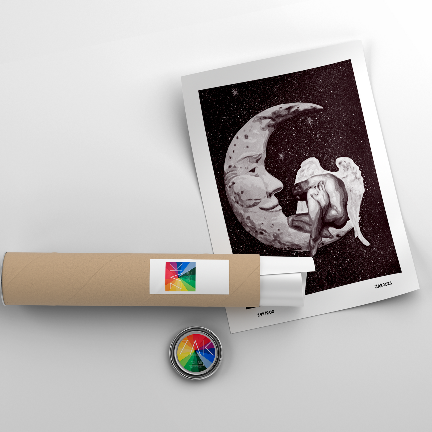 Art print of a celestial design with a roll of paper and a button on a light gray background