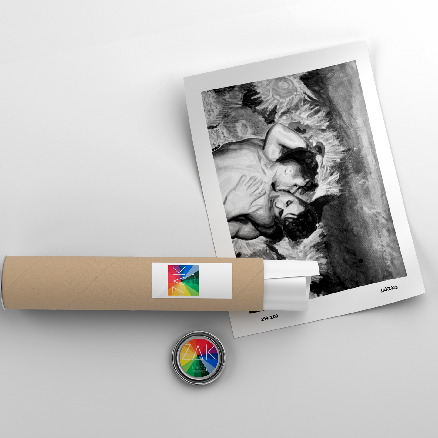 Rolled-up poster with a black and white photo of a couple embracing, on a light gray background.