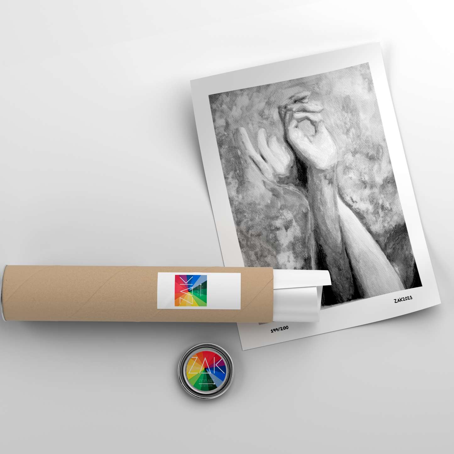 Framed black and white photo of a hand holding a heart, with a cylindrical product and colorful logo on a light gray background.