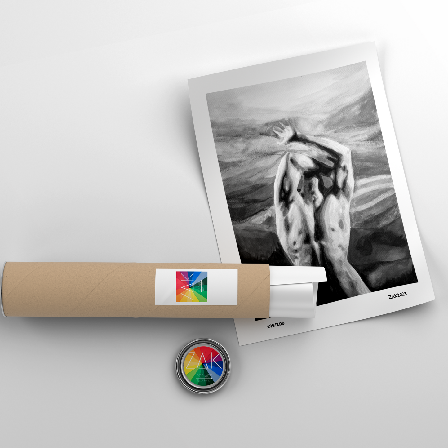 Framed black and white photo of a cat on a white surface with a cylindrical product and colorful label.