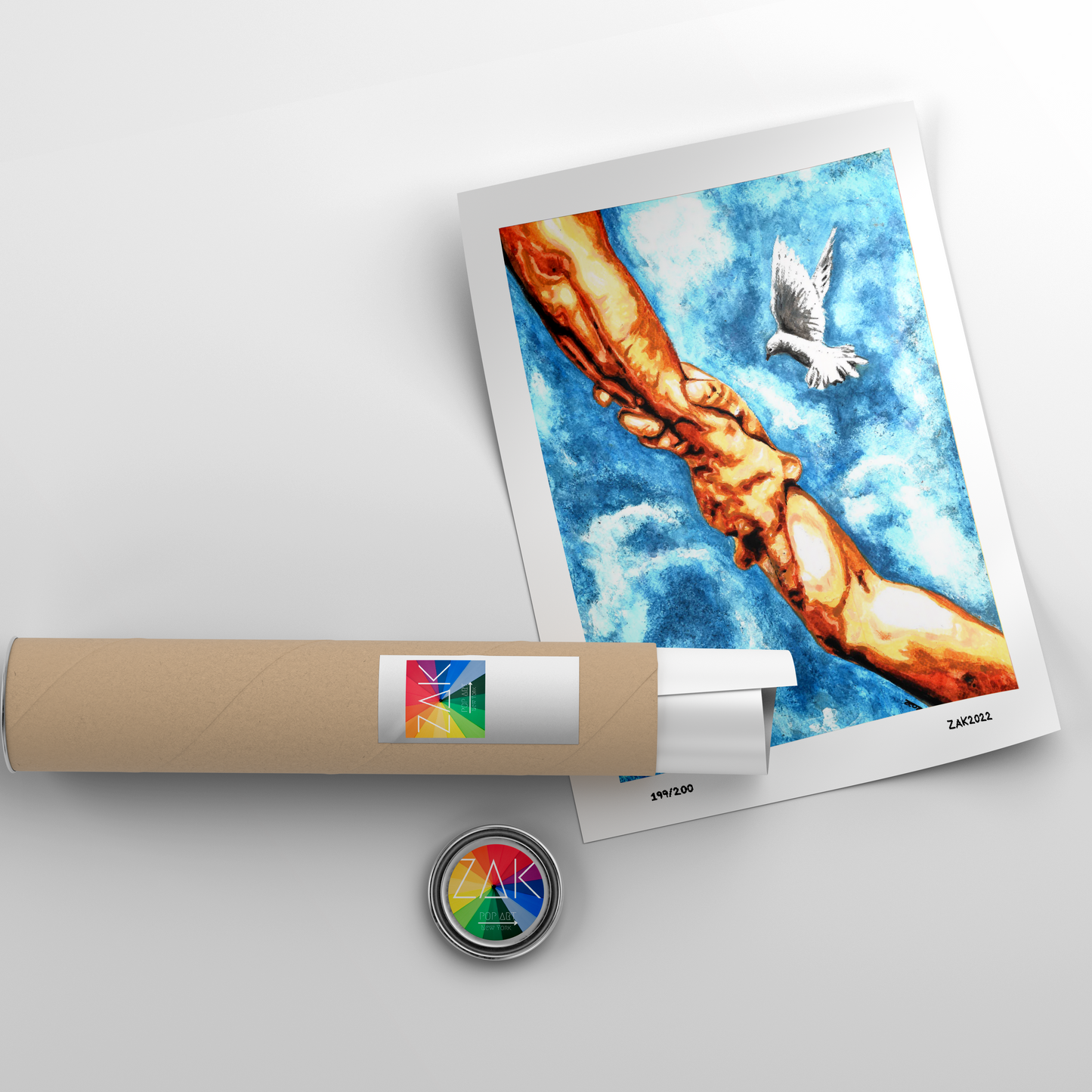 A framed watercolor print featuring hands and a dove in the sky, with a blue background.