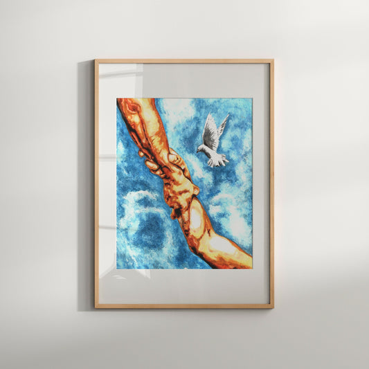A framed watercolor print featuring hands and a dove in the sky, with a blue background.
