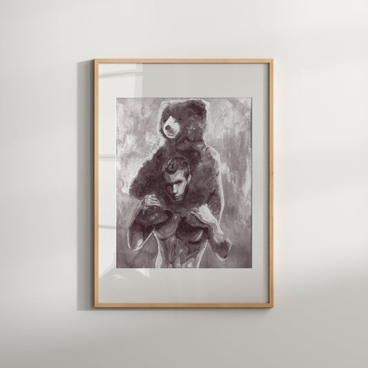 Black and white artwork of a male nude with a teddy bear on his shoulders, framed in a light wood enclosure.
