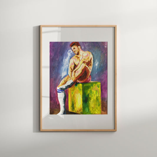 This image features a striking art print titled "Dirty Socks," which is a part of a limited edition Giclée series. The artwork depicts a nude male figure seated on a colorful, abstract block, creating a vibrant contrast against the dark background.