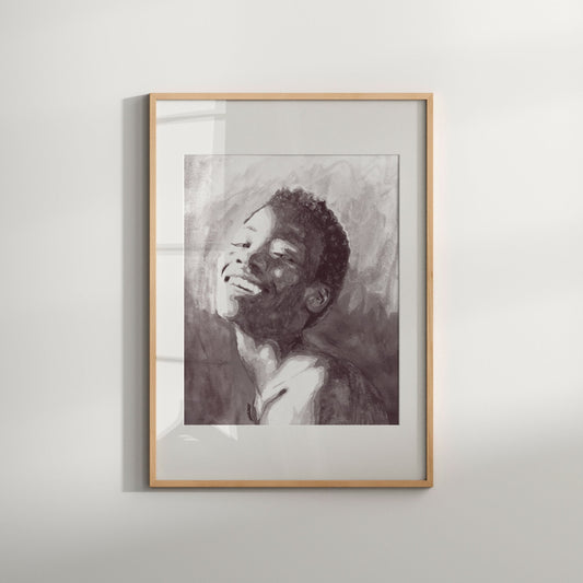 A fine art print featuring a black and white portrait of a woman with a faint smile, displayed in a simple frame.