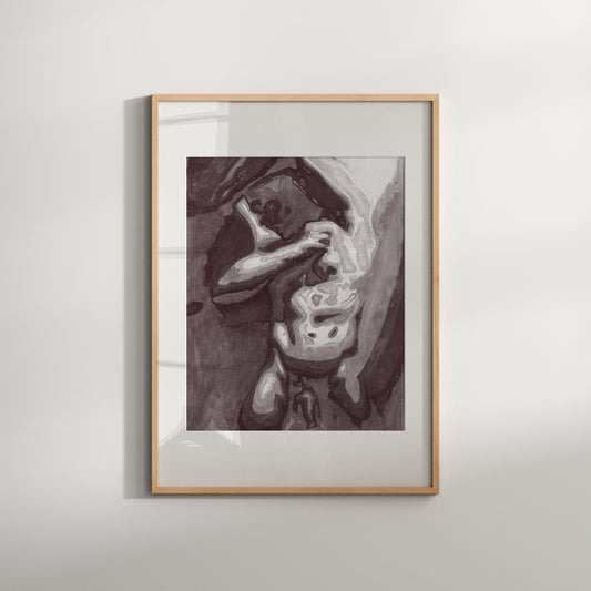 This image features a striking black and white art print which portrays a nude male figure in a sensuous and artistic pose. The print is framed in a simple, light wooden frame that enhances its modern aesthetic.