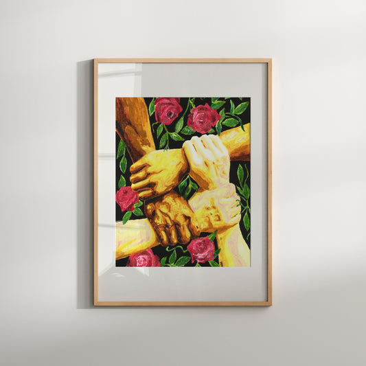 A framed watercolor art print featuring hands of a same-sex couple surrounded by floral elements, primarily in red and green colors.