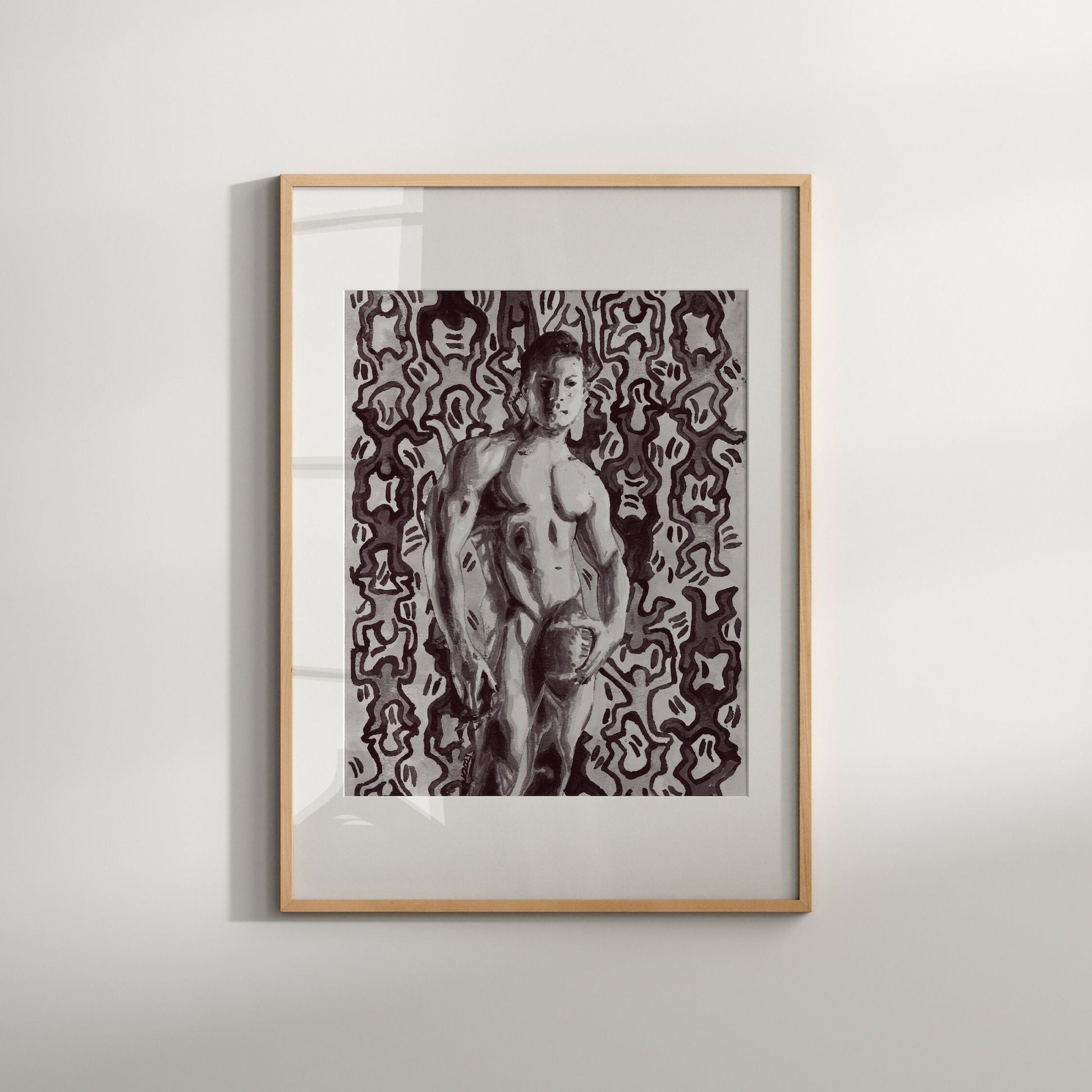 This image features a striking black and white art print of a painting by Keith Haring, presented in a simple, elegant frame. The artwork captures a male figure in a provocative pose, set against a patterned background that enhances the visual drama of the figure.