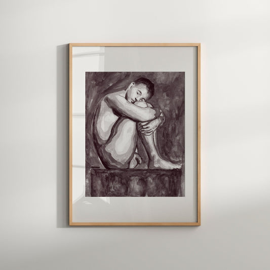 This image features a framed art print titled "Sleepy (B&W)," showcasing a vintage black and white photograph of a nude male. The artwork is characterized by a muted color palette, emphasizing the subtle tones and the detailed rendering of the figure in a contemplative pose.