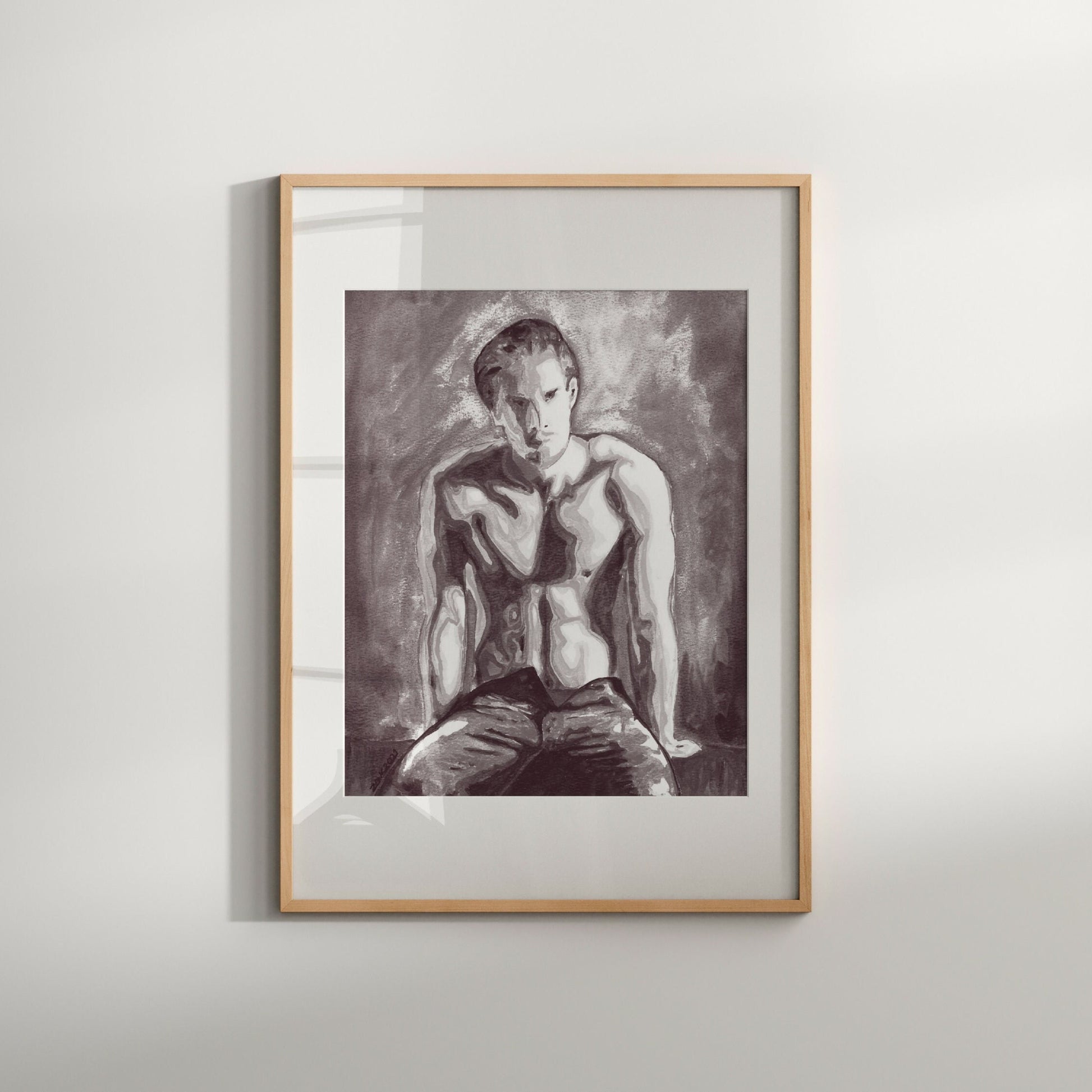 This image displays a framed art print titled "On the Bench," featuring a striking black and white depiction of a nude male figure. The artwork is characterized by soft, realistic lines that highlight the contours and form of the figure, creating a sense of depth and texture.