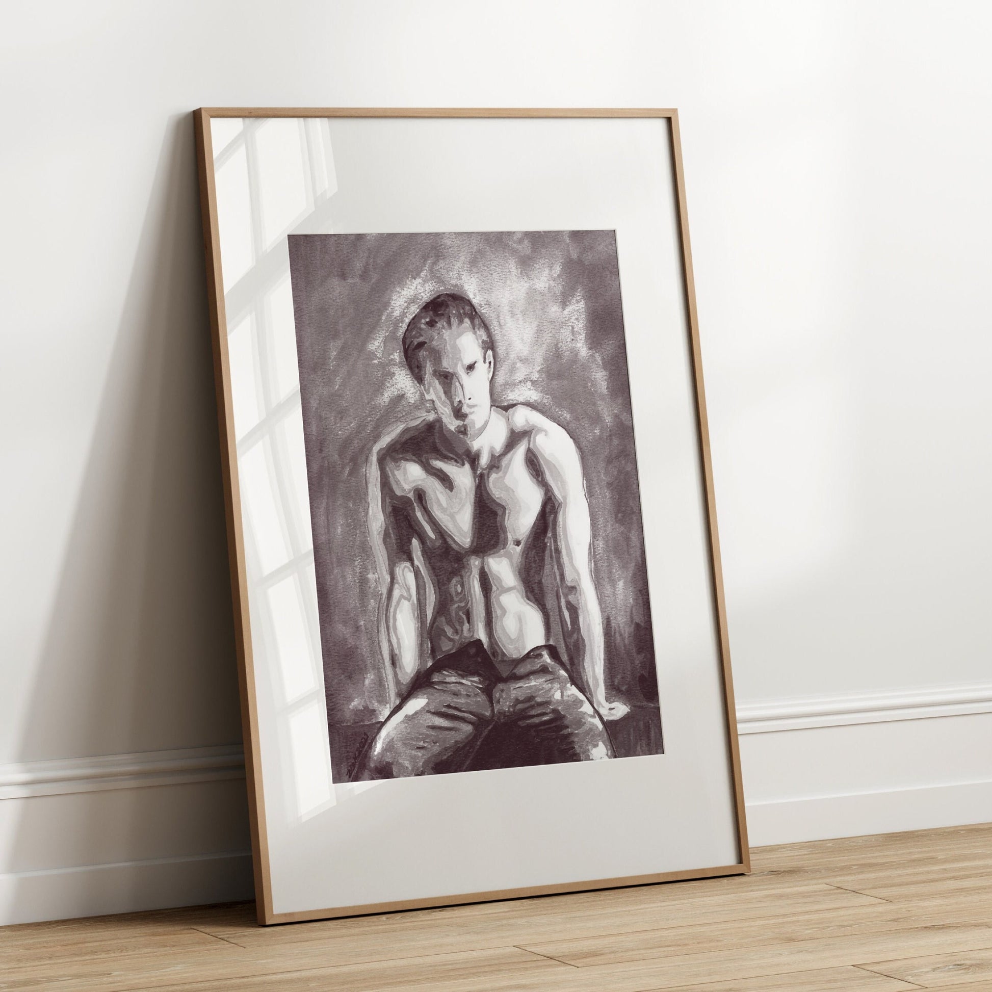 This image displays a framed art print titled "On the Bench," featuring a striking black and white depiction of a nude male figure. The artwork is characterized by soft, realistic lines that highlight the contours and form of the figure, creating a sense of depth and texture.