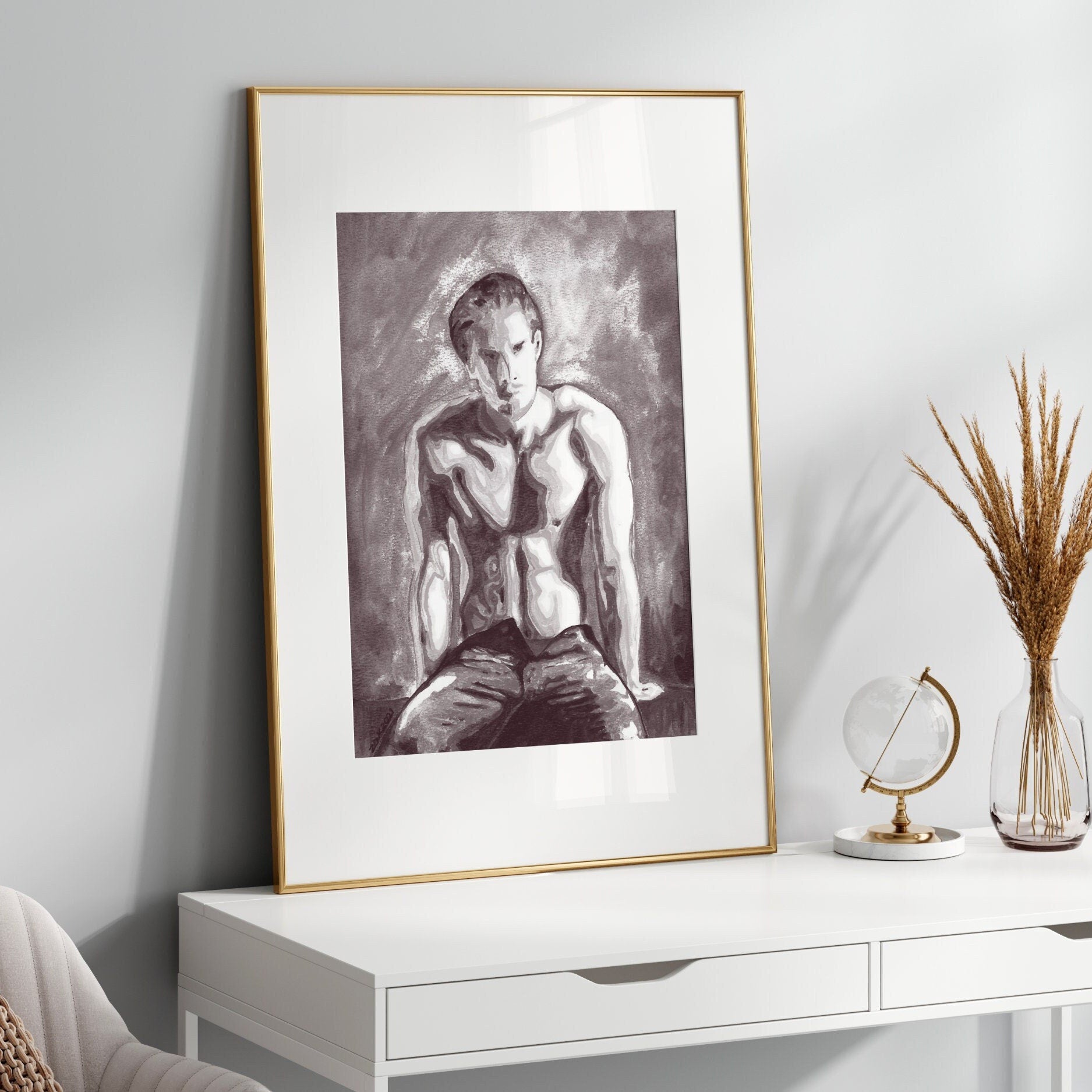 This image displays a framed art print titled "On the Bench," featuring a striking black and white depiction of a nude male figure. The artwork is characterized by soft, realistic lines that highlight the contours and form of the figure, creating a sense of depth and texture.