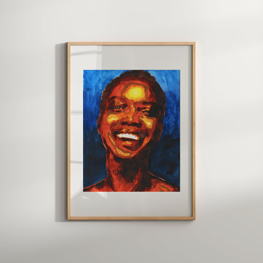 A framed art print featuring an abstract portrait of a woman with vibrant blue and orange colors, smiling.