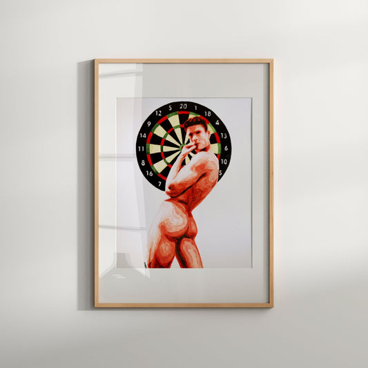 This image features an exclusive and striking print titled "Dartboard." The artwork combines a sensual depiction of a male nude figure with an erotic dartboard design, creating a unique blend of LGBTQ home decor.