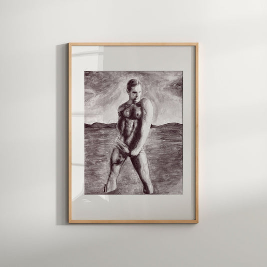 A black and white art print of a nude male figure posed with hands down, set against a cloudy sky background, framed in a light wooden frame.