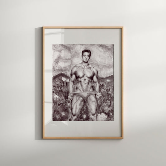 Black and white art print of a male model in underwear standing in a flower garden, framed in a light wood frame.