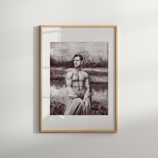 A black and white art print of a nude male figure standing in a flower garden, framed in a light wood frame.
