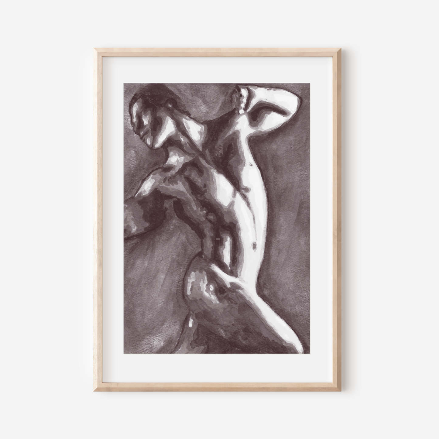 Framed artwork of a nude figure on a white wall