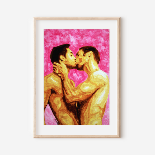 Framed artwork of two people kissing on a pink background