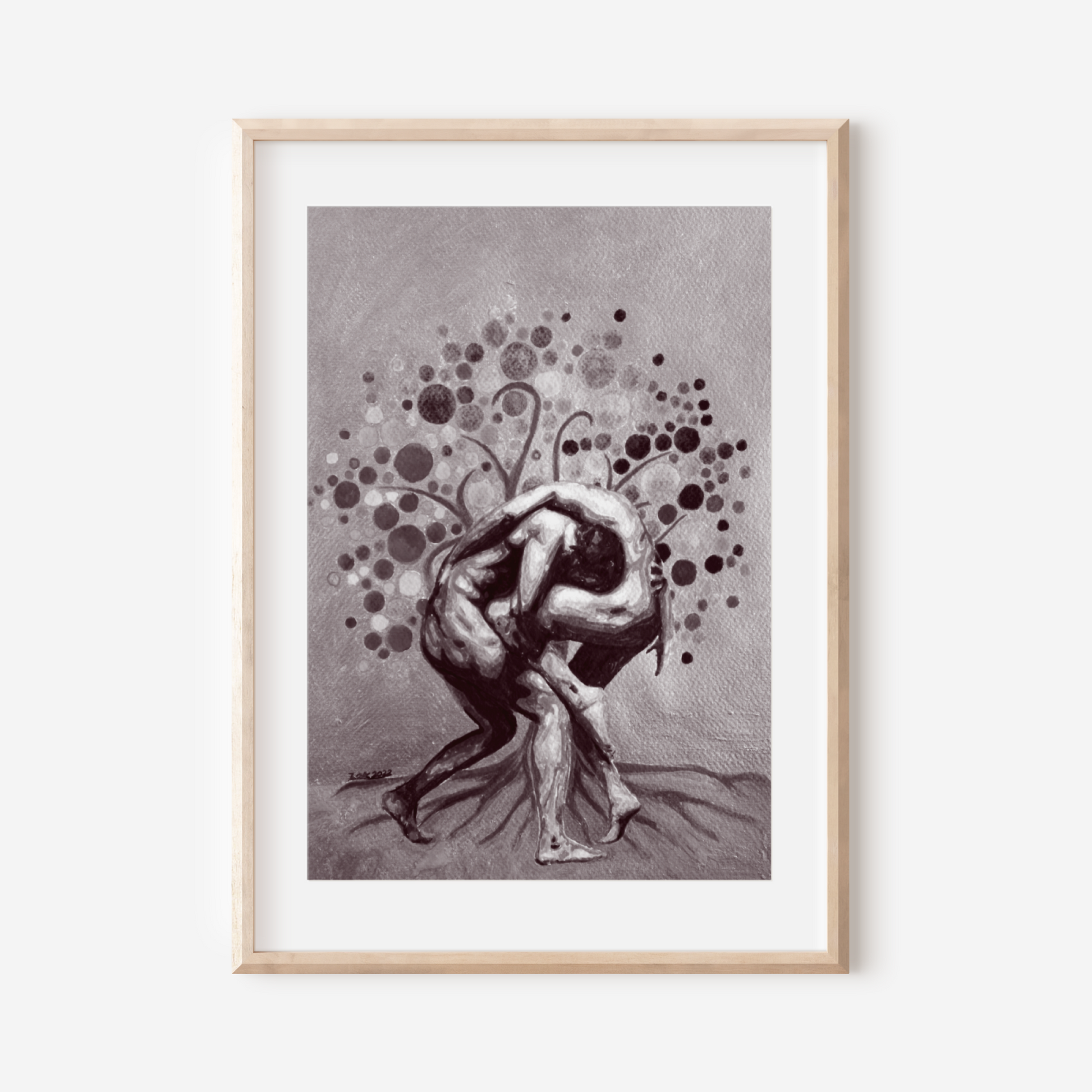 Framed artwork of a stylized human figure with abstract elements on a white wall.