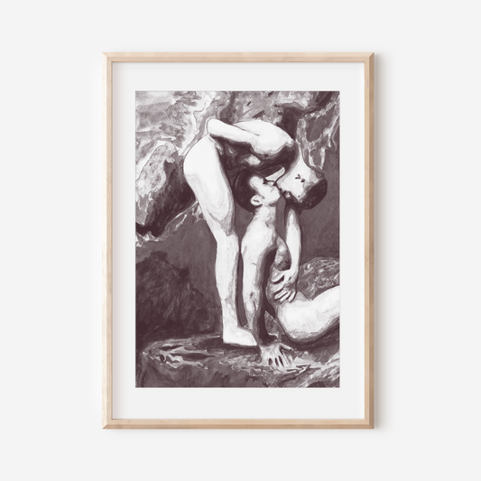 Framed black and white artwork of two figures embracing on a white wall.