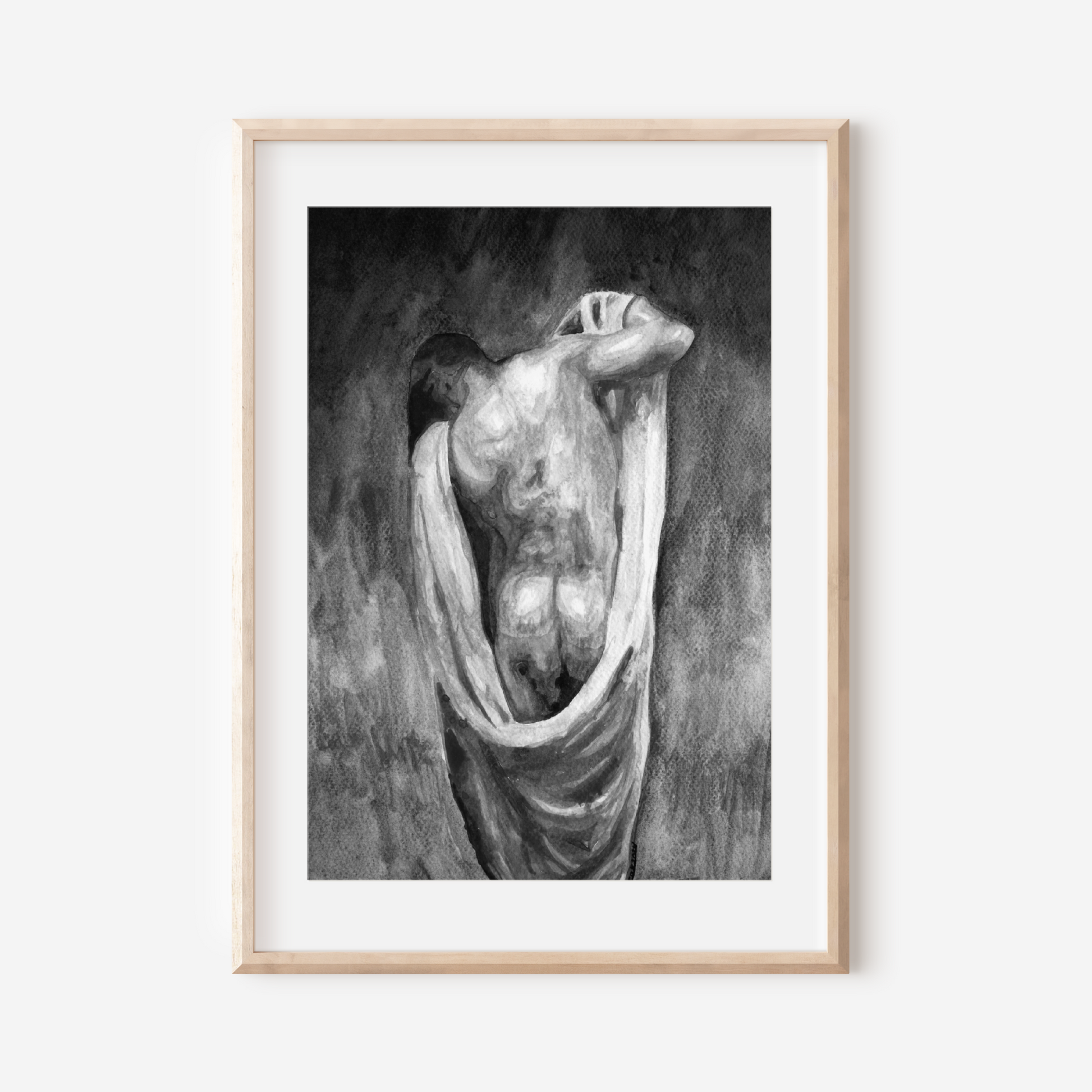 Framed artwork of a nude figure draped in fabric on a white wall
