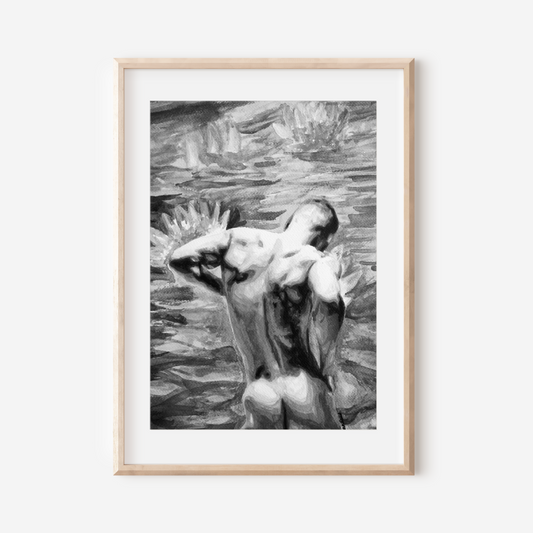 Framed black and white artwork of a nude figure on a white wall